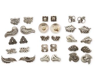 78
A Large Group Of Héctor Aguilar Earrings
1940-1945, 1943-1948, and 1948-1962; Taxco, Mexico
Variously stamped for Héctor Aguilar, Taxco, Silver, 940, or Sterling
Comprising fifteen pairs of silver screw-back earrings in a variety of classic styles, including geometric motifs and stylized botanical motifs

30 pieces
Size range: 0.75" L to 1.75" L
182.3 grams gross
Estimate: $400 - $600