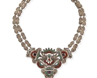 84
A Matl Sterling Silver And Gem-Set Necklace
1934-1955; Mexico City, Mexico
Stamped to clasp: Matl / Sterling / 925
Designed by Matilde Poulat, the silver filigree necklace with double-strand links supporting a segmented dove-motif centerpiece with coral, amethyst, and turquoise and silver fringe, with a box clasp
17.5" L x 3.5" H
102 grams
Estimate: $2,000 - $3,000