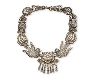86
A Matl Silver And Turquoise Necklace
1934-1948; Mexico City, Mexico
Stamped: Matl
Designed by Matilde Poulat, the repoussé rose and dove-motif necklace accented with turquoise-set eyes and seven silver and turquoise drops
19" L x 2.25" H
105.8 grams
Estimate: $2,000 - $3,000