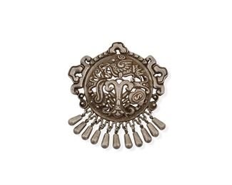 87
A Matl Silver Repoussé Brooch/Pendant
1934-1948; Mexico City, Mexico
Stamped twice: Matl
Designed by Matilde Poulat, a large silver repoussé medallion of a tree of life with bird surrounded by abstract repoussé scrollwork and silver drop fringe
3.5" H x 3.25" W
46.7 grams
Estimate: $800 - $1,200
