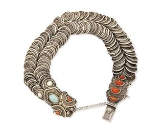 91
A Matl Snake-Motif Silver Bracelet
1934-1948; Mexico City, Mexico
Stamped: Matl / Hecho en Mexico / 0.925
Designed by Matilde Poulat, a bracelet of articulated links set with coral and turquoise to head and tail, with clasp closure and chain guard
7.5" L x 0.875" H
78.0 grams
Estimate: $500 - $700