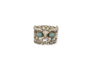 96
A Matl Owl Brooch
1934-1938; Mexico City, Mexico
Stamped: Matl
Designed by Matilde Poulat, an incised repoussé owl face brooch with cabochon turquoise eyes
1.5" H x 1.75" W
15.7 grams
Estimate: $200 - $400