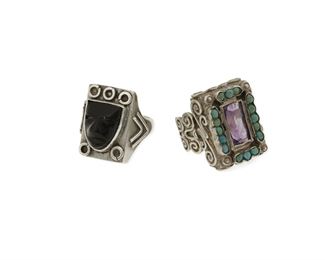 97
Two Matl-Style Silver And Gem-Set Rings
1934-1948; Taxco, Mexico
One stamped: Matl [on plaque]
Comprising a Matl silver ring with stone-set onyx mask, designed by Matilde Poulat, together with an unmarked Matl-style ring, gem-set with amethyst and turquoise

2 pieces
Each ring size: 6.25
25.3 grams gross
Estimate: $400 - $600
