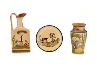 100
Three Tlaquepaque Campesino Pottery Items
Three works:

A Tlaquepaque pottery plate
Circa 1920s; Tlaquepaque, Mexico
Marked: Made in Mexico
The polychrome glazed pottery plate with a campesino, barking dog, and burro a outside home
9.5" Dia.

A Tlaquepaque pottery pitcher
Circa 1930s; Tlaquepaque, Mexico
Marked: Made in Mexico
The squared body, polychrome glazed pottery pitcher with a campesino scene to both sides
13.5" H x 6.75" W x 3.25" D

A Tlaquepaque pottery vase
Circa 1930s; Tlaquepaque, Mexico
Marked: Made in Mexico
The polychrome glazed pottery vase with pinched neck decorated with campesino scenes and petatillo crosshatching
10.5" H x 6.5" Dia.

3 pieces
Estimate: $300 - $500