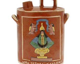 101
A Tlaquepaque Pottery Canteen
Circa 1930s; Tlaquepaque, Mexico
With partially faded stamp: Mexico
The double-sided, polychrome glazed canteen depicting Nuestra Senora de San Juan de los Lagos on one side and the Basilica de San Juan de los Lagos, Jalisco, on the other
7.25" H x 5.5" W x 3.25" D
Estimate: $200 - $400