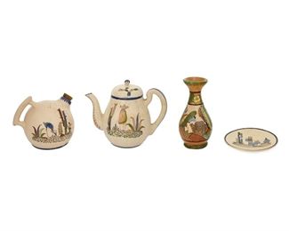 103
Four Tlaquepaque Campesino Pottery Items
Circa 1920s-1930s; Tlaquepaque, Mexico
Three marked: Made in Mexico; One marked: Mexico
Each glazed pottery with polychrome campesino motifs, comprising a small Desert plate (6.5" Dia.), a Donkey Blues lidded teapot (8" H x I0" W x 6" D), a Delicate Dan corked coffee pot (6" H x 7.5 W x 6.5" D), and a baluster-form vase with petatillo crosshatching, 4 pieces
Estimate: $200 - $400