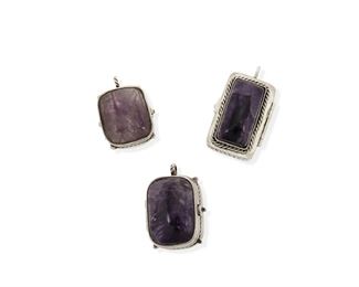 104
A Group Of William Spratling Silver And Amethyst Pill Box/Pendants
1933-1939 and 1940-1946, First Design Period; Taxco, Mexico
Each stamped for William Spratling; variously stamped: Taxco / 980 / Made in Mexico / Silver / Sterling
Comprising three amethyst set pill box/pendants with twisted rope detail, consisting of one with a long rectangular stone (2" L x 1.25" W) and two double-faced stone set boxes (2" L x 1.5" W x 1.5" D and 1.75" L x 1.5" W x 1" D)

3 pieces
214.2 grams gross
Estimate: $1,000 - $1,500