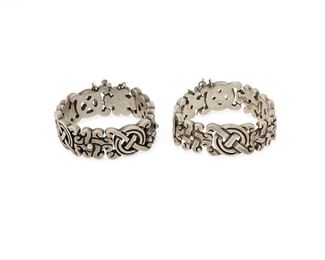 128
A Pair Of William Spratling Silver Bracelets
1933-1939 and 1940-1946, First Design Period; Taxco, Mexico
Each stamped for William Spratling; One stamped: Made in Mexico / Sterling; One stamped: Taxco / 980
Each bracelet designed with chased silver stylized cross links, with pin clasps and chain guard

2 pieces
7.25" L and 7" L x 0.75" H
218.0 grams gross
Estimate: $700 - $900