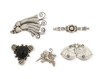 132
A Group Of William Spratling Silver And Obsidian Brooches
1933-1939 and 1940-1946, First Design Period; Taxco, Mexico
Each stamped for William Spratling; Each variously stamped: Made in Mexico / Silver / 930 / 980 / Sterling
A group of four whimsical silver brooches, comprising a butterfly (1.5" H x 2.5" W), a hummingbird (1.5" H x 1.5" W), a large flower (2" H x 3.25" W) and stylized arrows (0.75" H x 3" W), as well as an obsidian set abstract swirl brooch (1.75" H x 1.75" W)

5 pieces
91.5 grams gross
Estimate: $700 - $900