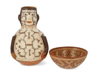 144
Two Shipibo-Conibo Pottery Vessels
Fourth-Quarter 20th Century; Shipibo-Conibo people, Peru
Each with polychrome, stylized snake geometric patterning, comprising an effigy vessel (14" H x 9" Dia.) and a stew bowl (4" H x 9" Dia.), 2 pieces
Estimate: $300 - $500
