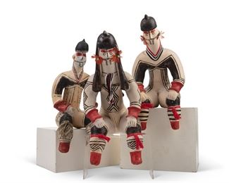 145
Three Karajá Pottery Figures
Circa 1950s; Karajá people, Brazil
Each seated figure with duotone red and black decorations and fabric, corn husk, and feather embellishments, comprising two male figures (each: 14" H x 8" W x I0" D approximately) and one female figure (each:15" H x 8" W x I0.5" D approx.), 3 pieces
Estimate: $600 - $800