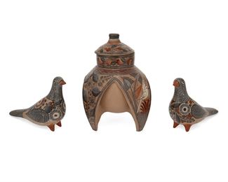 161
Three Tonalá Bruñido Pottery Items, By Amado Galvan
(1893-1954, Tonalá, Mexico)
Two signed
Comprising a lidded "pomegranate" jar with avian and floral motifs (9" H x 7" Dia.) and two dove figures decorated with floral motifs (each: 5.5" H x 8" W x 3.25" D), 3 pieces
Estimate: $400 - $600