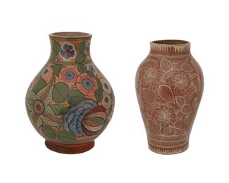 163
Two Tonalá Bruñido Pottery Vases
Circa 1920s; Tonalá, Mexico
One marked: Made in Mexico
Comprising an urn-form jar with cream floral motifs and sawtooth bands on red (11" H x 7" Dia.) and a bulbous jar with polychrome floral motifs (11" H x 9" Dia.), 2 pieces
Estimate: $300 - $500