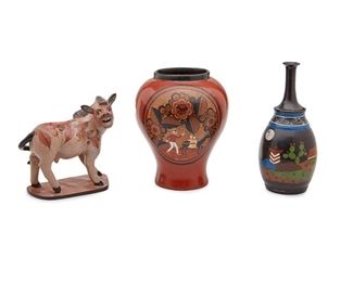 165
Three Tonalá Bruñido Pottery Items, By Angel Ortiz, Sr.
Three works:

A bruñido bottle
Fourth-Quarter 20th Century; Tonalá, Mexico
Signed: A. Ortiz, Mexico
With campesino sitting on a rock with a full moon
12.5" H x 5.5" Dia.

A bruñido vessel
Fourth-Quarter 20th Century; Tonalá, Mexico
Signed: A. Ortiz, Mexico, Tonalá
With a calaca man and donkey on one side and a calaca woman on the other
11" H x 9" Dia.

A bruñido nahual figure
Fourth-Quarter 20th Century; Tonalá, Mexico
Signed: A. Ortiz, Mexico
The figure of a nahual transforming into an angry steer
9.375" H x 9.25" W x 4.25" D

3 pieces
Estimate: $200 - $300