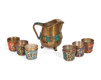 194
A Salvador Terán Mosaic And Brass Drink Set
Third-Quarter 20th Century
Each marked: Handwrought / Salvador / Hecho en Mexico
Each with polychrome glass mosaic on brass depicting jaguar motifs, comprising a pitcher and six cups, 7 pieces
Pitcher: 7.375" H x 8" W x 6" D; Each cup: 3" H x 3.25" Dia. approximately
Estimate: $300 - $500