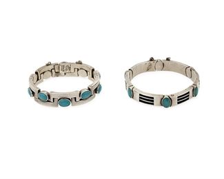 217
Two Antonio Pineda Sterling Silver And Turquoise Bracelets
Two works:

A geometric-styled link bracelet set with oval turquoise cabochons
1953-1979; Taxco, Mexico
Crown mark for Antonio Pineda; Further stamped: [Eagle 58] / Hecho en Mexico / 970
6.375" L x 0.5" H

A rectangular link bracelet with oval turquoise cabochons
1962-1963; Taxco, Mexico
Crown mark for Antonio Pineda; Further stamped: [indistinct eagle] / ZZ940 / Los Castillo / Soc Coop Scl Sec 2 / Silver
7.25" L x 0.375" H

2 pieces
Estimate: $1,200 - $1,800