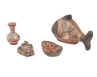 227
Four Tonalá Bruñido Pottery Pieces
Four works:

A triangular ashtray adorned with a rabbit figure and avian motifs
Circa 1950s; Tonalá, Mexico
3.625" H x 6.5" W x 6375" D

A frog figure with floral motifs
Circa 1970s; Tonalá, Mexico
Marked: Tonala / Mexico
4.5" H x 8.5" W x 8.5" D

A vase with avian motifs
Circa 1980s; Tonalá, Mexico
Marked: Mexico
8.625" H x 5" Dia.

A fish figure with floral and animal motifs
Circa 1970s; Tonalá, Mexico
12" H x 7.5" W x 20" D

4 pieces
Estimate: $200 - $300