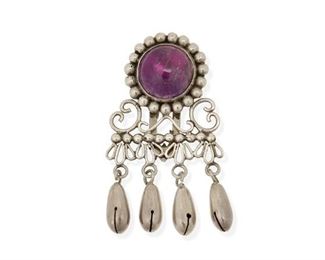 235
An Antonio Pineda Silver And Amethyst Dress Clip
1941-1948; Taxco, Mexico
Stamped: AP / Taxco / 980
A stone set cabochon amethyst atop a wirework design with four bell dangles
2.5" H x 1.5" W
22 grams
Estimate: $200 - $300