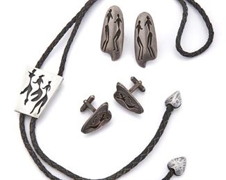 246
A Group Of Antonio Pineda Lascaux-Motif Sterling Silver Jewelry
1953-1979; Taxco, Mexico
Crown mark for Antonio Pineda; Each variously stamped: [Eagle 17] / Hecho en Mexico / Silver / 970
Comprising a bolo tie with leather strap and spade-shaped endcaps (1.625" L x 1.375" W, strap: 38" L) and two pairs of swivel-back cufflinks (largest cufflinks: 2" L x .75" W)

5 pieces
93.5 grams gross
Estimate: $500 - $700