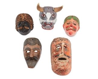 271
Five Latin American Festival Masks
Circa 1940s
Ox mask inscribed in ink: Sebastian [partially illegible]
Each polychromed carved wood, comprising four Mexican masks, two with glass eyes and one with animal horns, and a Guatemalan mask depicting a man with a beard, 5 pieces
Larger: 12.125" H x 7" W x 5" D; Smaller: 7" H x 6" W x 4.5" D
Estimate: $600 - $800