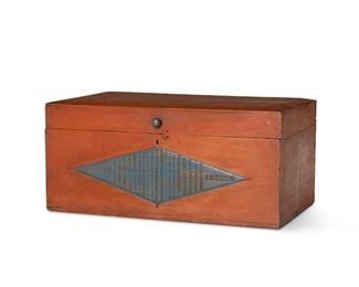 304
A Guatemalan Chip-Carved Painted Wood Trunk
Circa 1990; Guatemala
The lidded trunk painted red with a blue knob and blue chip-carved diamond to front
15" H x 33" W x 18.75" D
Estimate: $400 - $600