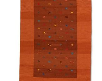308
A Contemporary Mexican Rug
Late 20th/Early 21st Century; Oaxaca, Mexico
The wool rug woven in orange centering a rust-colored panel dotted with polychrome geometric symbols
84.5" L x 58" W
Estimate: $400 - $600