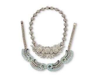 309
Two Margo De Taxco Enamel Necklaces
1948-1978; Taxco, Mexico
Each stamped for Margot de Taxco / Sterling / Made in Mexico / [Eagle 16]; Further numbered
Designed by Margot Van Voorhies, comprising a green and blue "Diamonds & Dots" necklace No. 5552 (14" L x 1" H) and a white "Wild Leaves with Flowers" necklace No. 5744 (17" L x 1.625" H x 4.5" W)

2 pieces
184.0 grams gross
Estimate: $1,000 - $1,500