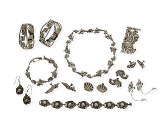 322
A Large Group Of Margot De Taxco Silver Jewelry
1948-1978; Taxco, Mexico
Most stamped: Margot de Taxco / Sterling / Made in Mexico / [Eagle 16]; each further stamped with design number
Designed by Margot Van Voorhies, comprising a grape motif link necklace No. 5747 (16.25" L x 0.75" H) with matching bracelet (7.5" L x 0.75" H); a stylized foliate and ball link bracelet No. 5270 (8" L x 0.75" H) with matching unmarked earrings (1" L); two matching hinged bracelets No. 5337 (6.75" inner C and 7" inner C x 0.875" H); a stylized foliate wide link bracelet No. 5127 (6.5" inner C x 1.25" H); and five pairs of ear clips No. 5145, No. 5128, No. 5149, No. 5113, No. 5120 (range: 1.5" L to 0.75" L)

18 pieces
261.0 grams gross
Estimate: $1,500 - $2,500