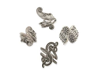 325
A Group Of Margot De Taxco Silver Bracelets
1948-1978; Taxco, Mexico
Each stamped: Margot de Taxco / Sterling / Made in Mexico / [Eagle 16]; Each further stamped with design number
Designed by Margot Van Voorhies, consisting of four crossover hinged bangles, comprising an openwork arabesque design No. 5635, (7" inner C x 3.5" H), a stylized leaf and silver ball wire design No. 5339 (6" inner C x 3.5" H), a solid curved design with wave terminals No. 5410 (6" inner C x 2.5" H), and a heavy all-over foliate design with silver ball cluster terminals No. 5316 (6.5" inner C x 2.5" H)

4 pieces
362.0 grams gross
Estimate: $1,000 - $1,500