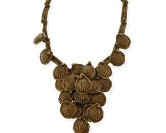 332
A Pal Kepenyes Bronze Shell Necklace
Second Half 20th Century
Stamped: Pal Kepenyes
A necklace of articulated links suspending a central plaque with attached and linked scallop shell charms
16" L x 4.5" H
136.0 grams
Estimate: $400 - $600