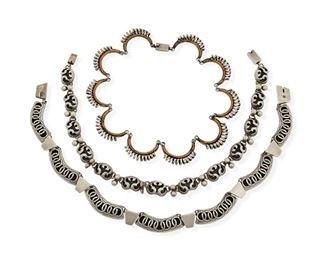 341
A Trio Of Victoria Silver Necklaces
1948-1958; Taxco, Mexico
Each stamped: Victoria / Taxco / Mexico / Sterling / [Eagle 12]; Each further variously stamped with design number
Designed by Ana María Nuñez Brilanti, comprising a necklace with filigree openwork overlay links with ball spacers No. 53 (16" L x 0.5" H); an openwork overlay link necklace with interlaced circles and silver spacers No. 62 (15.5" L x 0.5" H); and a necklace of coiled silver and copper crescent links No.186 (14.25" L x 1" H)

3 pieces
192.0 grams gross
Estimate: $500 - $700