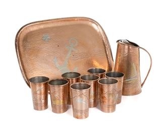 349
A Los Castillo Mixed-Metal Nautical Drink Set
Third-Quarter 20th Century
Each marked for Los Castillo / Taxco; Pitcher and tray further marked: Handwrought / Hecho en Mexico
The hand-hammered copper, brass, and silver drink set comprising a pitcher (9.5" H x 7.25" W x 5.5" D), eight highball glasses (each: 5" H x 3.75" Dia.), and a tray (19.5" W x 14.5" D) decorated with boats, anchors, and various sea creatures, 10 pieces
Estimate: $600 - $900