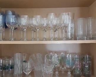 Tons of glasses, wine glasses and mugs