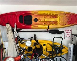 Pelican kayak (bottom yellow) measures 10.3’.  Perception Sport (top red and yellow measures 11.6’.
