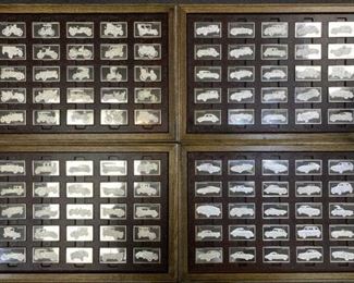 For your consideration is this collection of (100) Sterling Silver Car Art Bars in Chest, Franklin Mint.  Wow!  These are the full size, 1000 Grain Sterling Silver bars (NOT the miniature set which goes for way less).  Converted, each bar has approx. 1.93 troy oz  Actual Silver Weight of pure silver.  Comes in a very nice wooden and leather chest.  Features tons of awesome makes and models from the early 1900s to the 70s.  Includes Porsche, Ferrari, Maserati, Ford and so many more!
NOTE: Please do not wait until last minute to bid on anything over $1000 as we will have to manually check and approve your registration.  Reminder: non-payment will get you banned from all HiBid auctions. Please do not bid unless you are ready to pay.