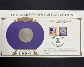 For your consideration is this 1886-O Morgan Silver Dollar, Carded w/ Stamp