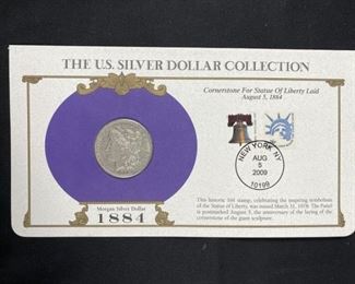 For your consideration is this 1884 Morgan Silver Dollar, Carded w/ Stamp