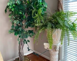 Two Indoor Artificial Decorative Plants and One Ornate Ceramic Pillar Plant Stand