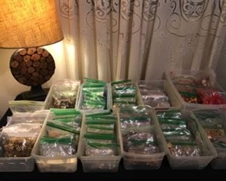 Some of the jewels and buttons from the collection of a Jewelry Artist from New Orleans. Thousands of pieces sold by the bag