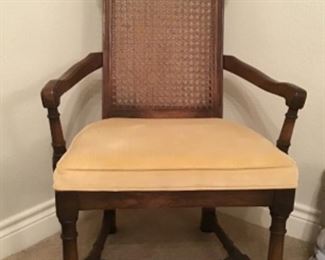 Matching pair of mid century cane back chairs