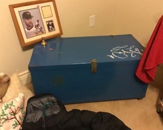 Blue trunk on rollers, baseball picture