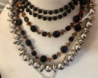 NAVAJO BENCH BEAD NECKLACE AND CHARLES PRATT CHEYENNE/ARAPAHO HORNED TOAD PENDANT ON CHAIN.