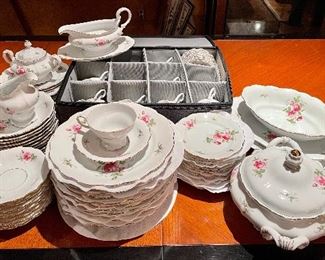 Item 85:  Johann Haviland "Chippendale Rose":  $395             12 dinner plates, 12 dessert plates, 12 fruit bowls, 11 soup bowls, 12 saucers & 11 cups, 1 sugar & creamer, gravy boat, 2 platters, veggie dish, covered bowl 