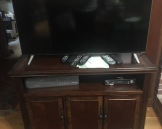 Large screen Vizio TV w/ walnut TV Storage Cabinet