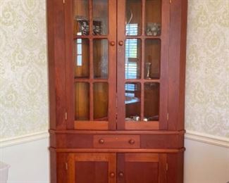 Small cherry Corner Cabinet w/ glass doors and lots of storage