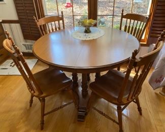 Walnut pedestal Kitchen Table (w/ 2 leaves) and 4 slat-back Dining Chairs
