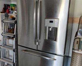 Brand - GE Profile Stainless Steel Fridge - French Doors w/ice & water dispensers                                         (Dimensions) - 70 inches tall, 36 inches wide & 33 inches deep, Model Number - PFSS5JPJXB