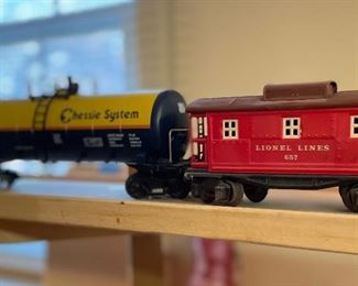 M.T.H. 20-92007 "O" Scale Chessie Single Dome Tank Car  & 1939 Vintage Lionel 657 Red Caboose w/ Brownish Red roof 