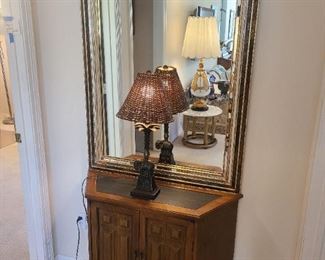 Extra large beveled edge framed mirror
Elephant table lamp
Small credenza 