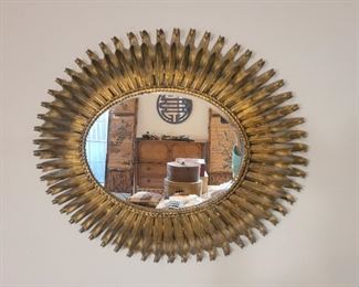 Mid-century sunburst gilt metal over mirror